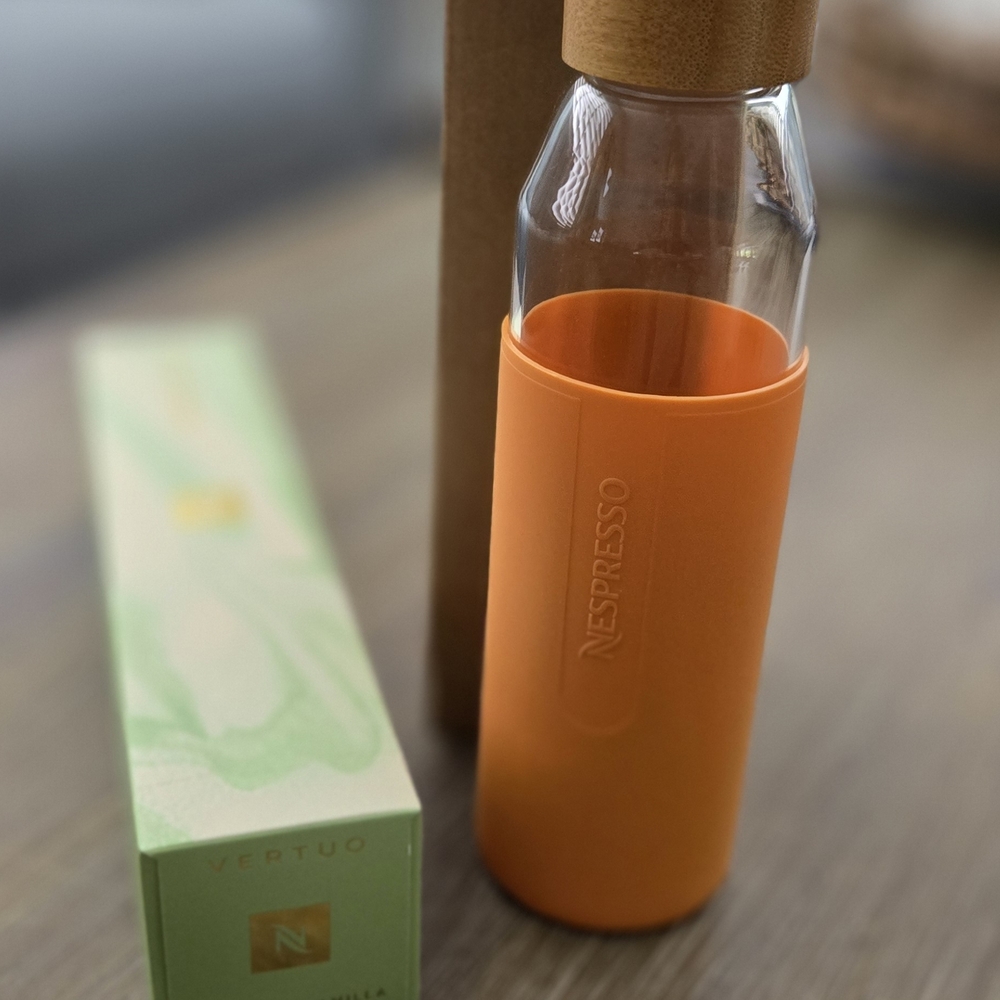 Nespresso Glass Water Bottle & Sleeve Of Pistachio Vanilla Double Espresso